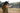 Woman at range with Blue Training Pistol